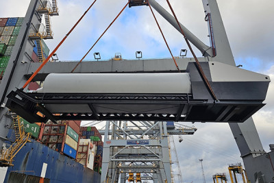 One of the pumps being loaded onto the container ship