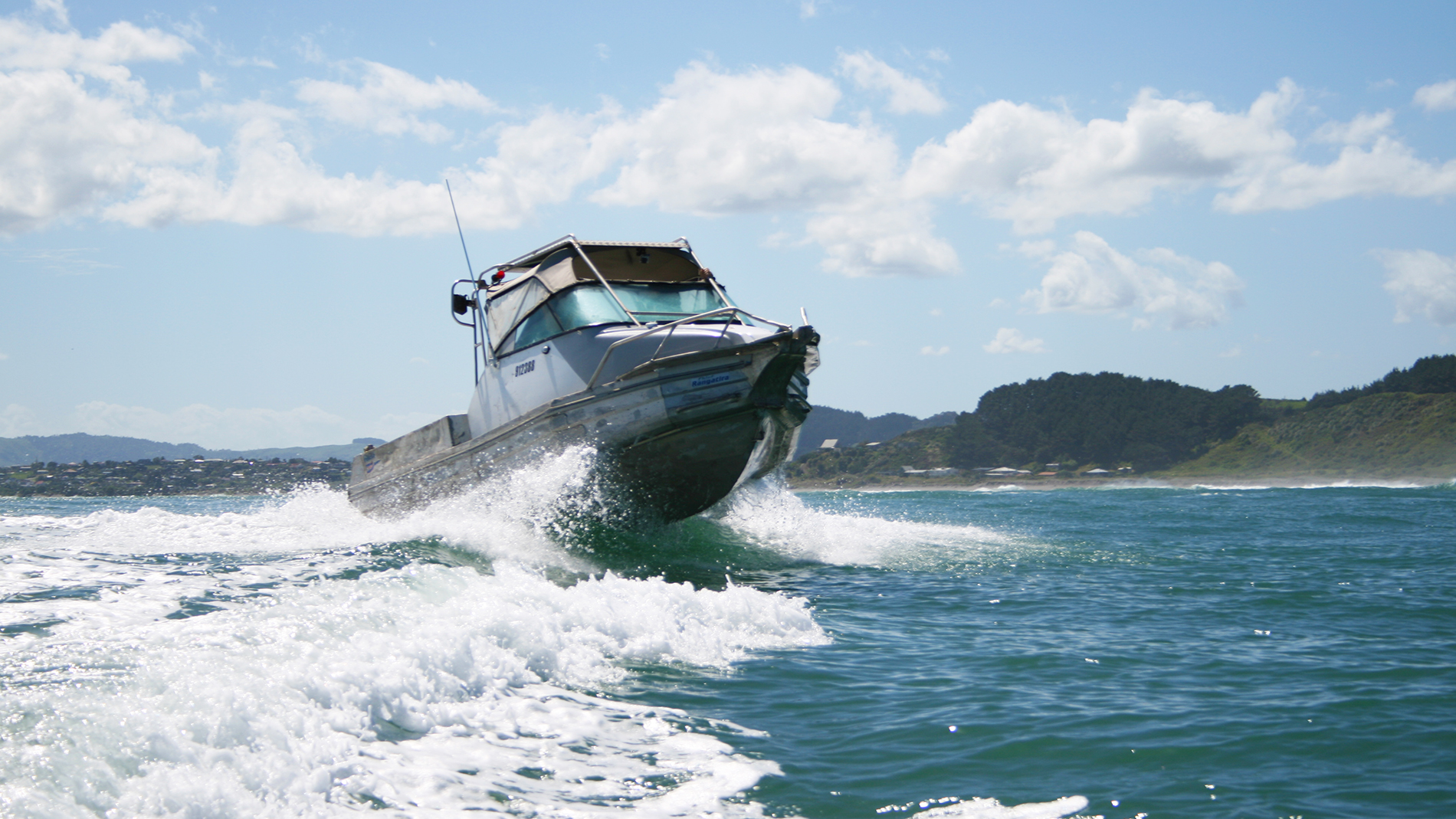  Photo of boat crossing bar