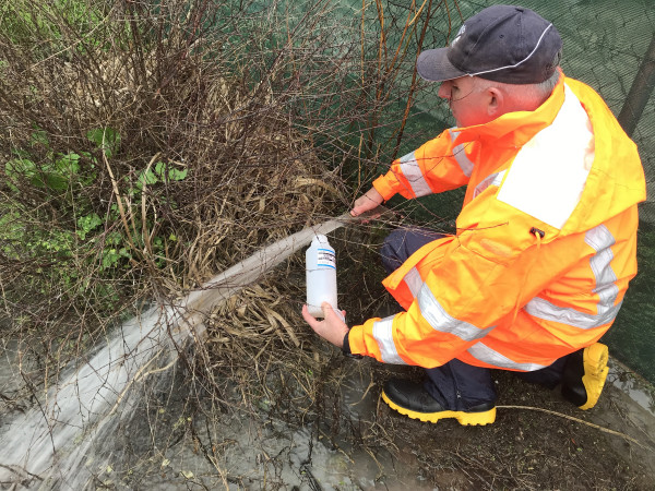 Sample taken of discharge at time of discovery by council staff.