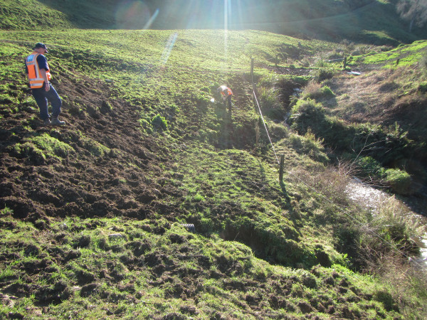 Waikato Regional Council officers inspecting contaminated Matapara Stream.